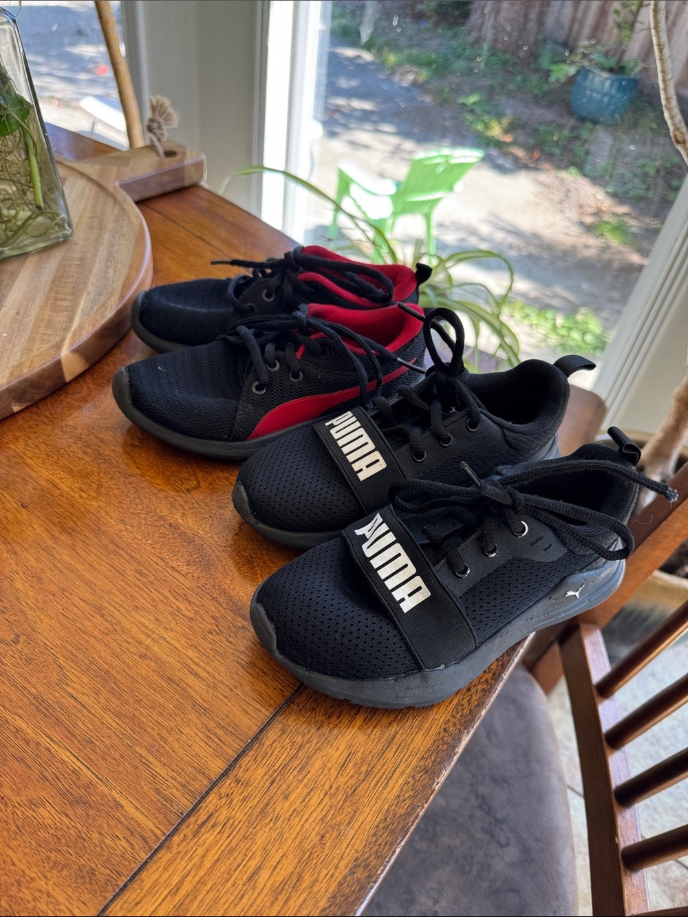 Two pairs of puma sneakers
